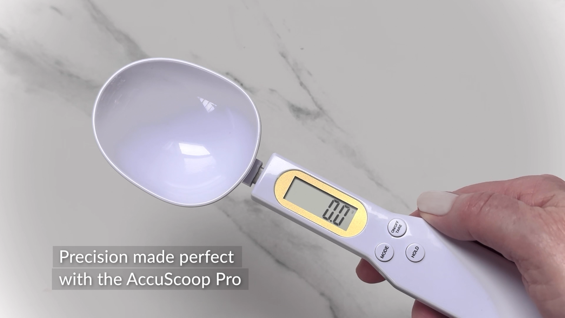 The AccuScoop Pro is shown accurately weighing and measuring 10 grams of protein powder. 